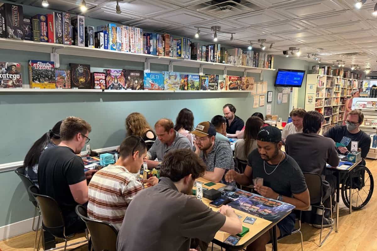 Customers playing games in store