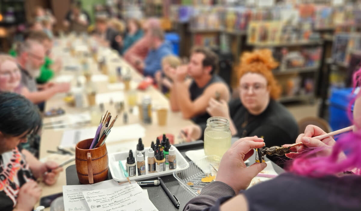 Image of person painting a figure